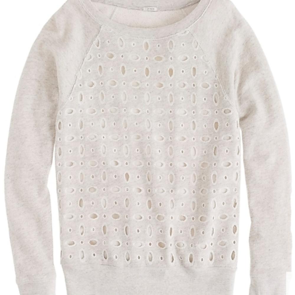 Beautiful top with perforated details. Brand New.